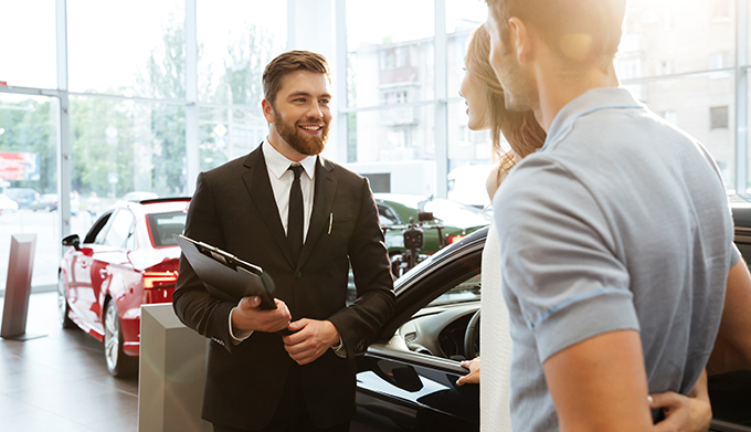 Couple at dealership