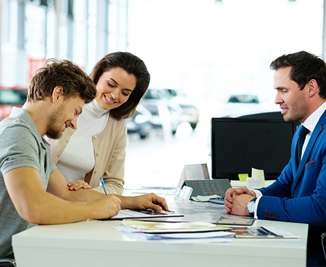 couple at dealership